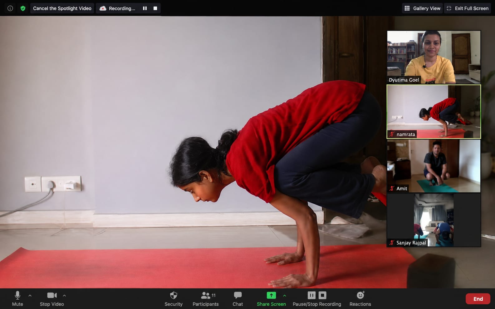 A live Sivananda class on Zoom — students practicing in their own homes, the teacher watching every screen.