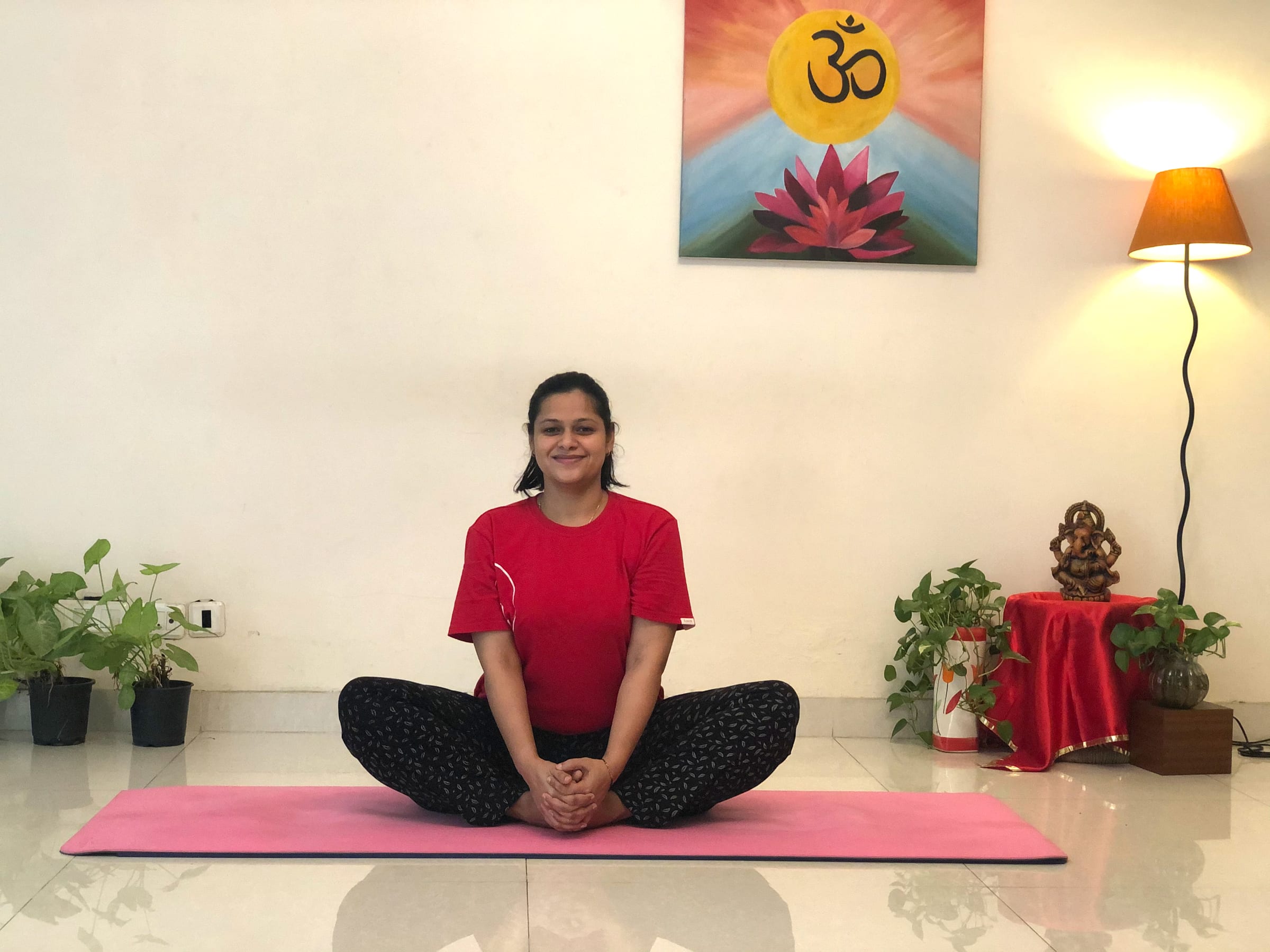 Priti in a seated prenatal yoga posture at Sivananda Yoga Centre Gurgaon